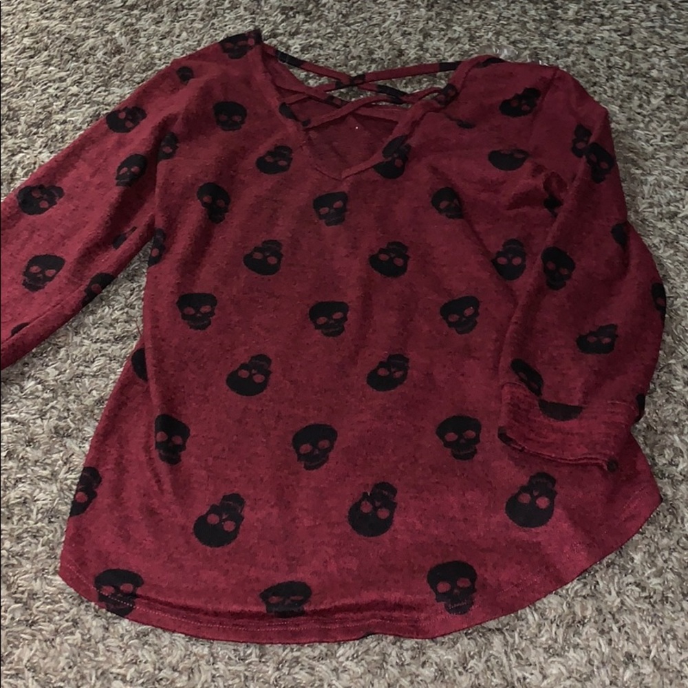 Skull and maroon shirt